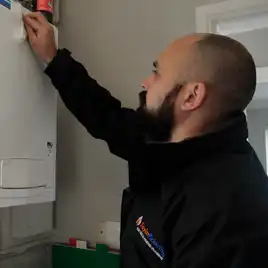 Jason Cleaning A Boiler